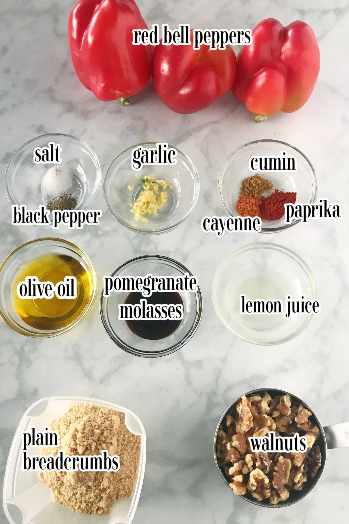 Muhammara ingredients on a marble surface. Muhammara Recipe (Red Pepper and Walnut Dip) Muhammara Recipe (Red Pepper and Walnut Dip) muhammara ingredients
