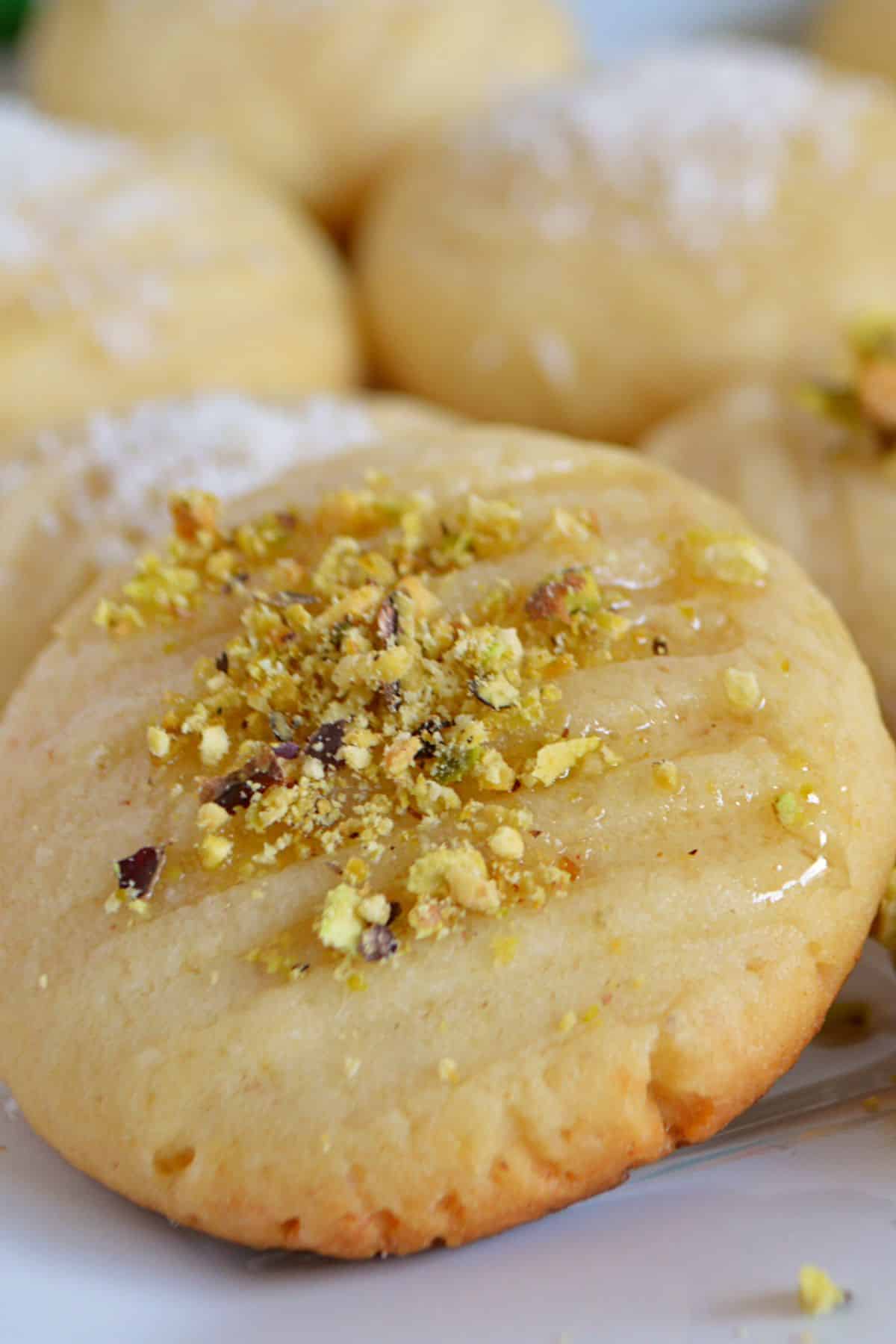 Şekerpare cookie garnished with pistachios.