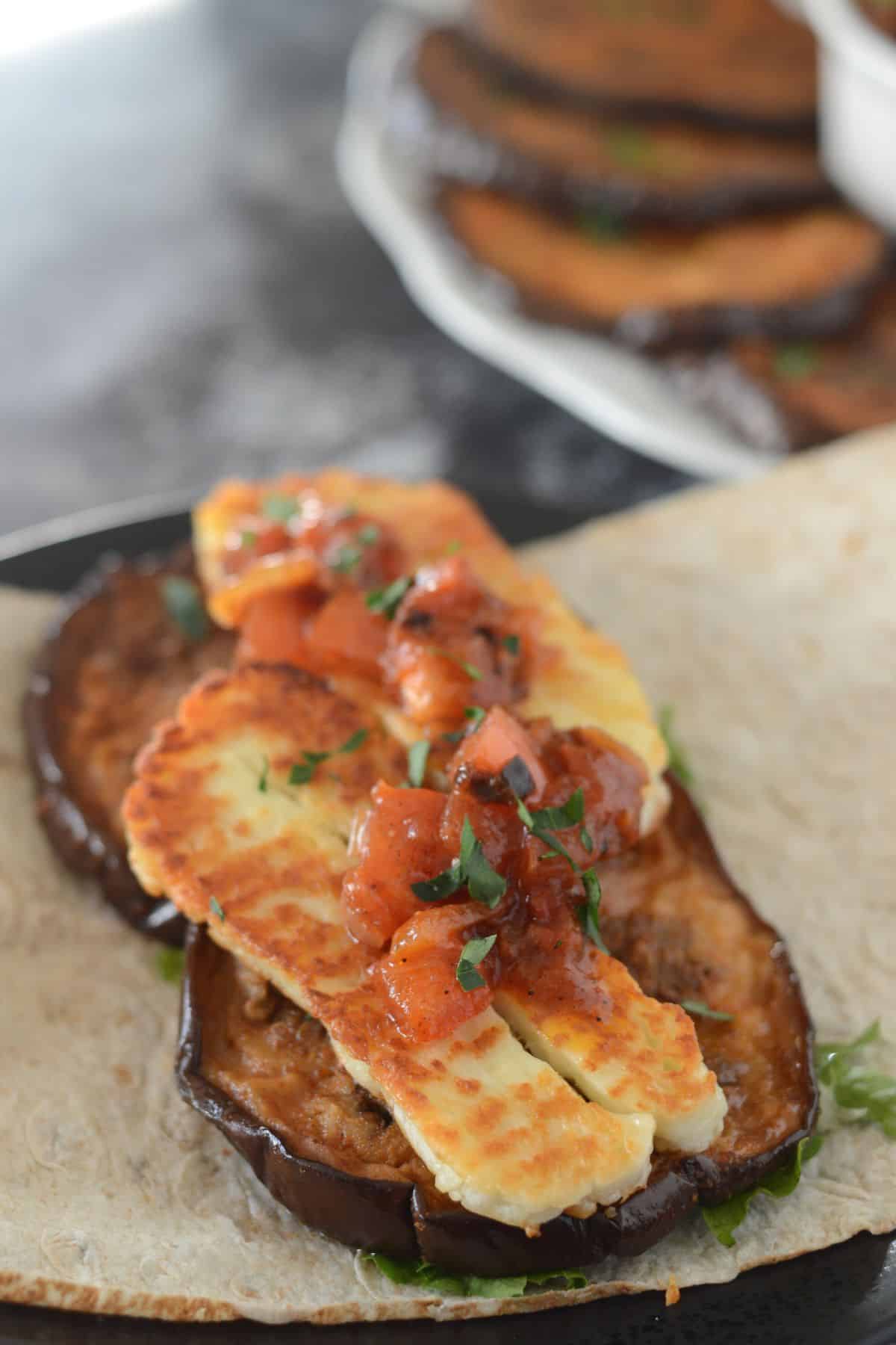 Roasted eggplant sliced topped with Haloumi cheese.