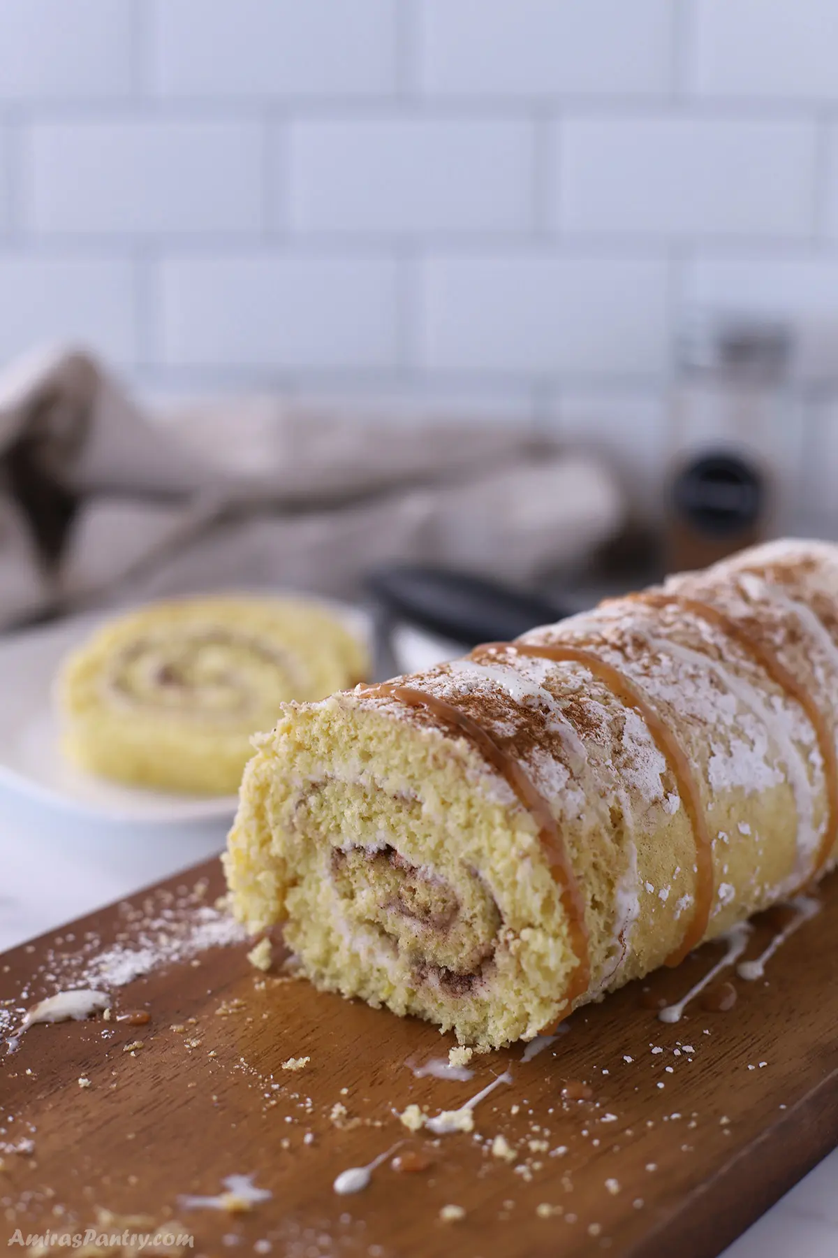 A close up look at a cut swiss roll to show texture.