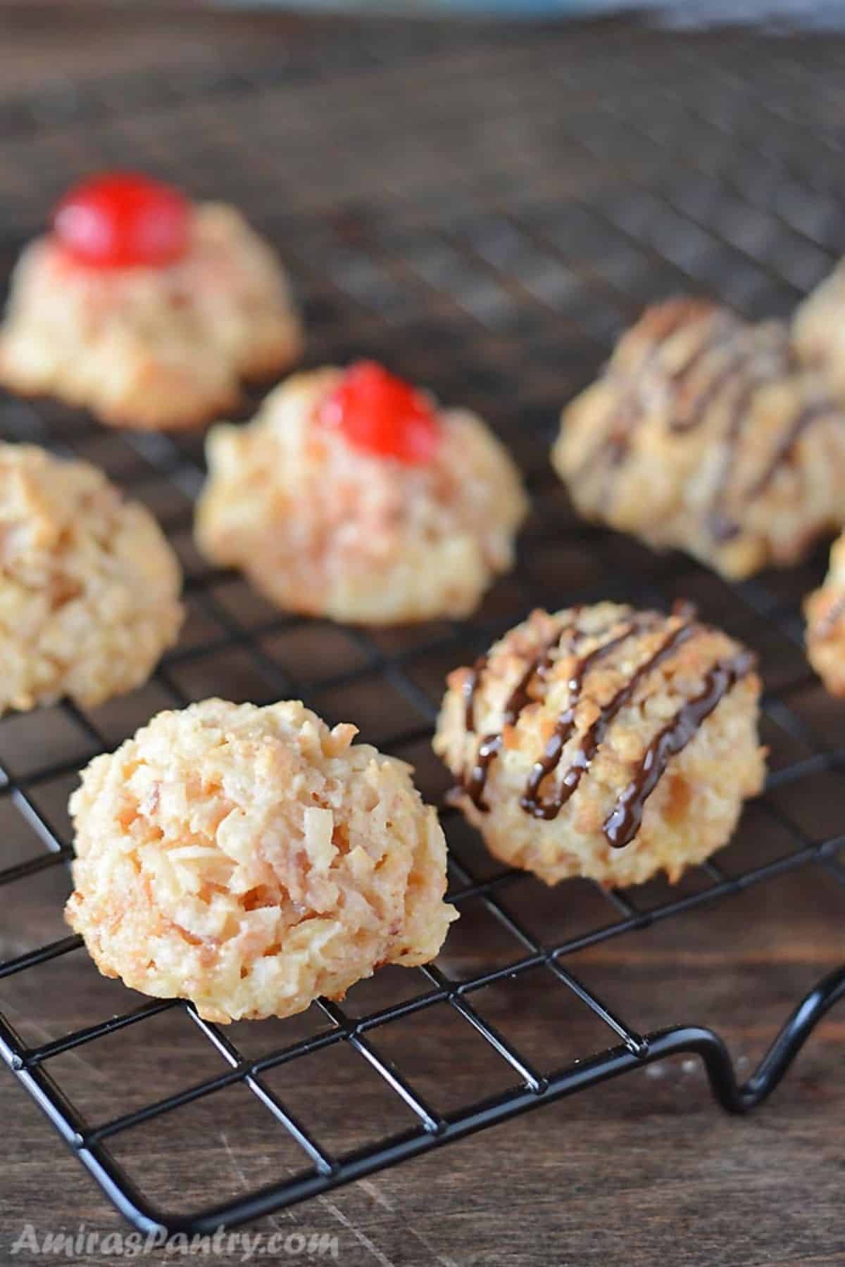 A close up look at some coconut macaroons on a cooling rack.
