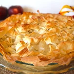 A pie dish with phyllo apple pie.
