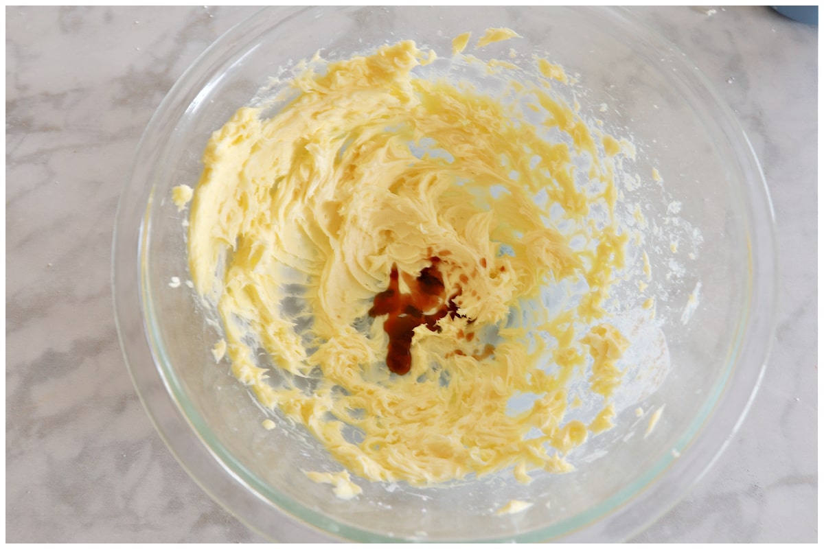 Creamed butter and sugar in a bowl with vanilla.