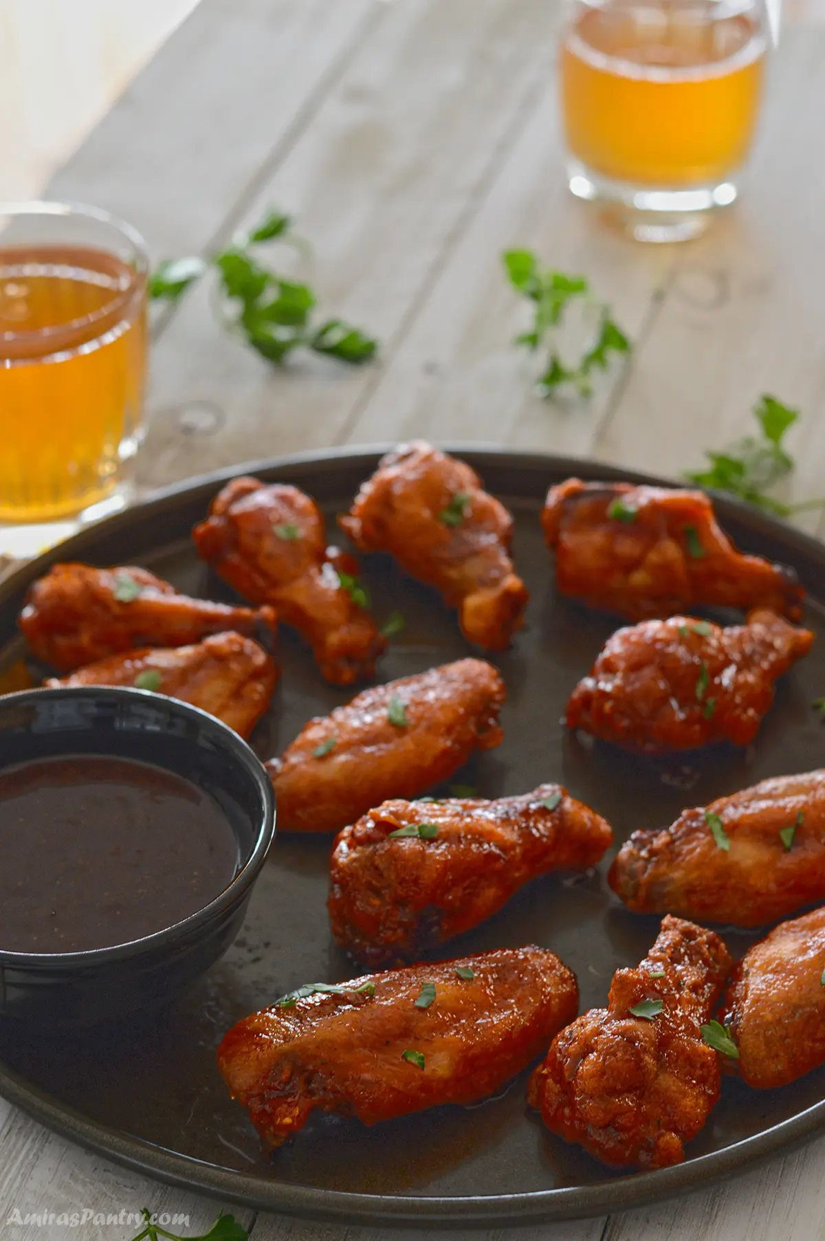 BBQ wings on a serving tray.
