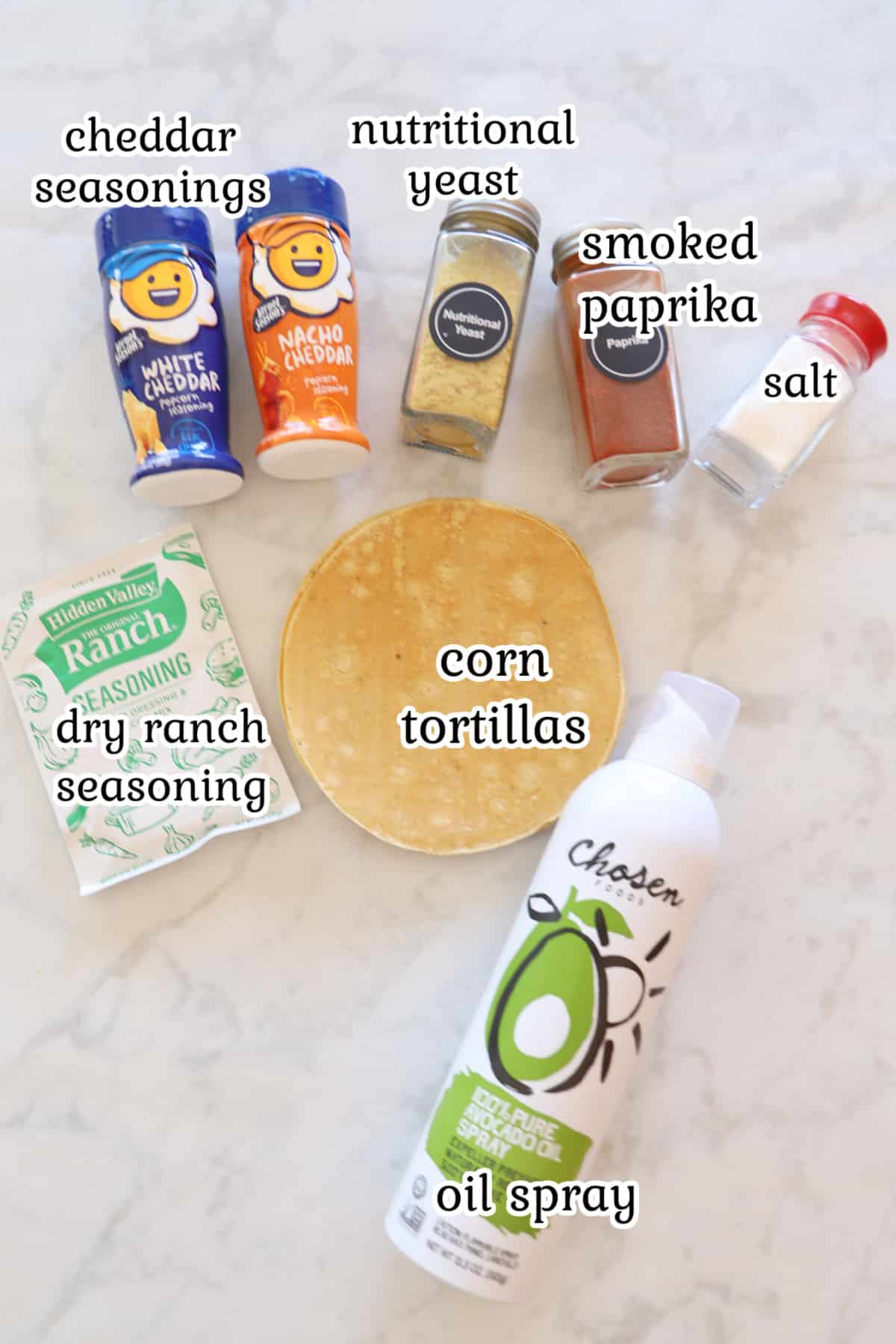 Homemade doritos ingredients on a white surface.
