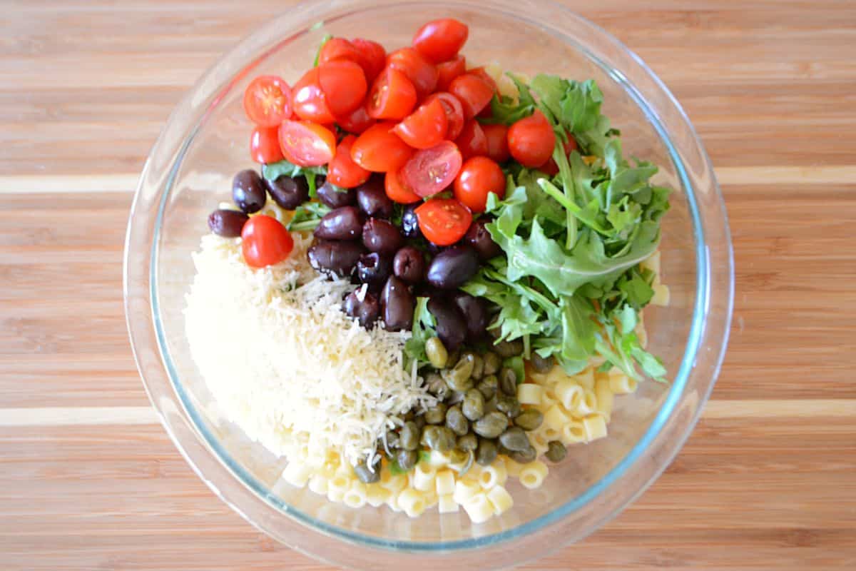 Basic pasta salad ingredients in a bowl.