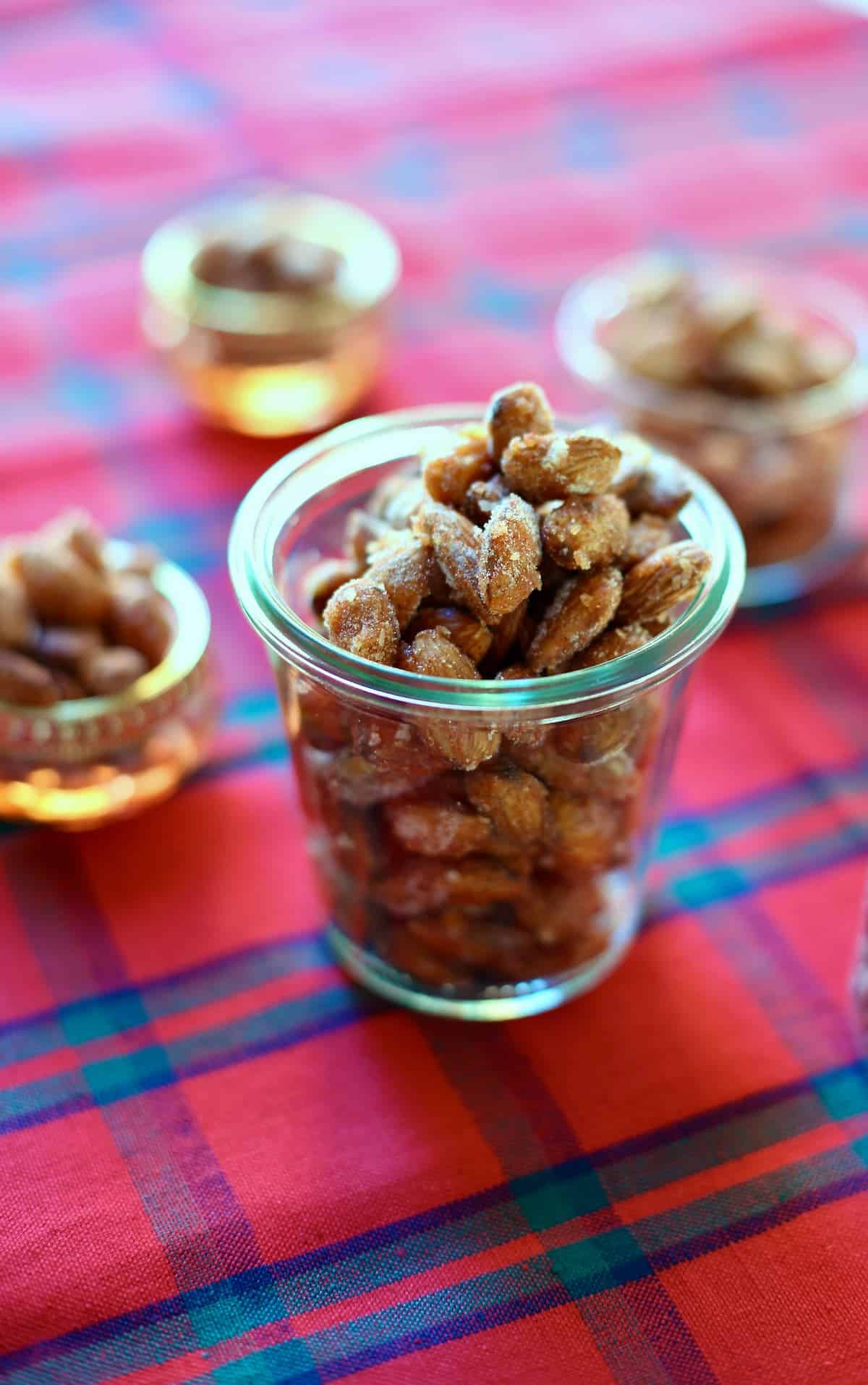 Sweet and spicy almonds in serving cups.