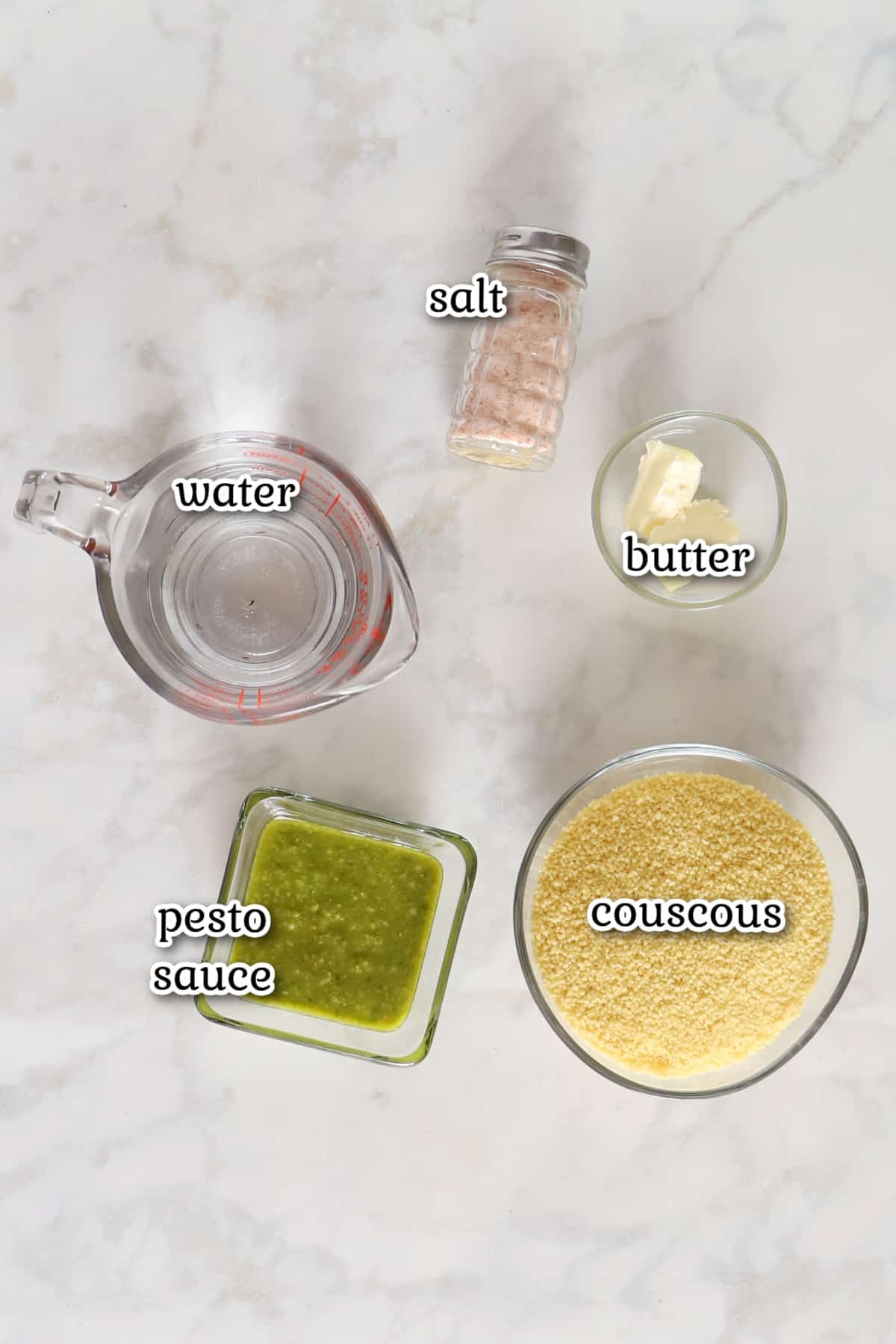 Ingredients for pesto couscous with text overlay.