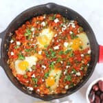 A close up of Shakshouka in a Pan