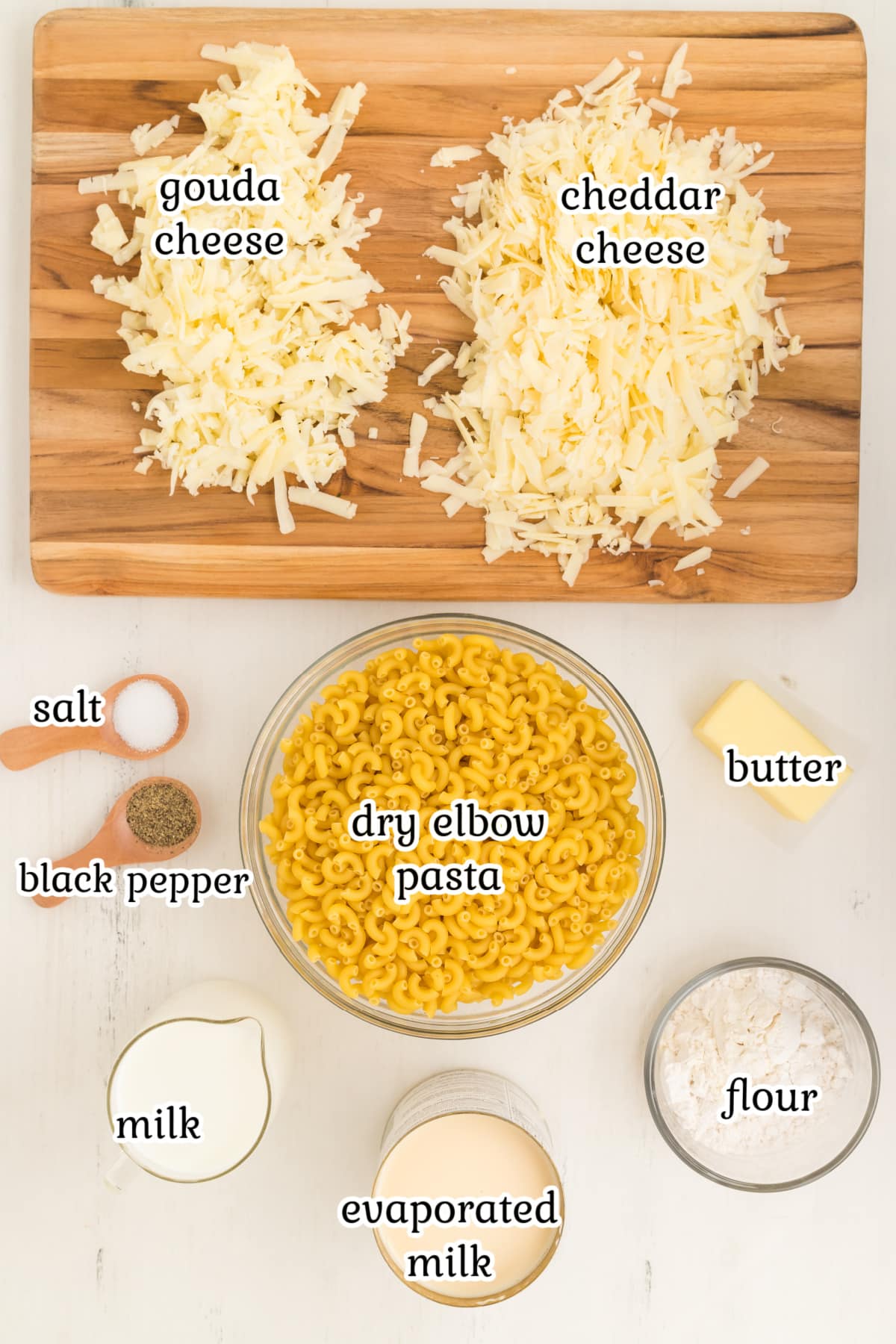Gouda mac and cheese recipe ingredients on a countertop.