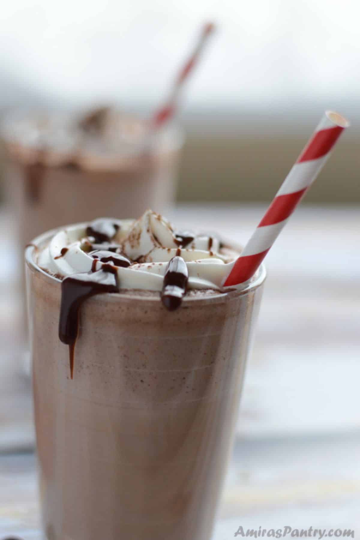 A side view of a cup of nutella milkshake.