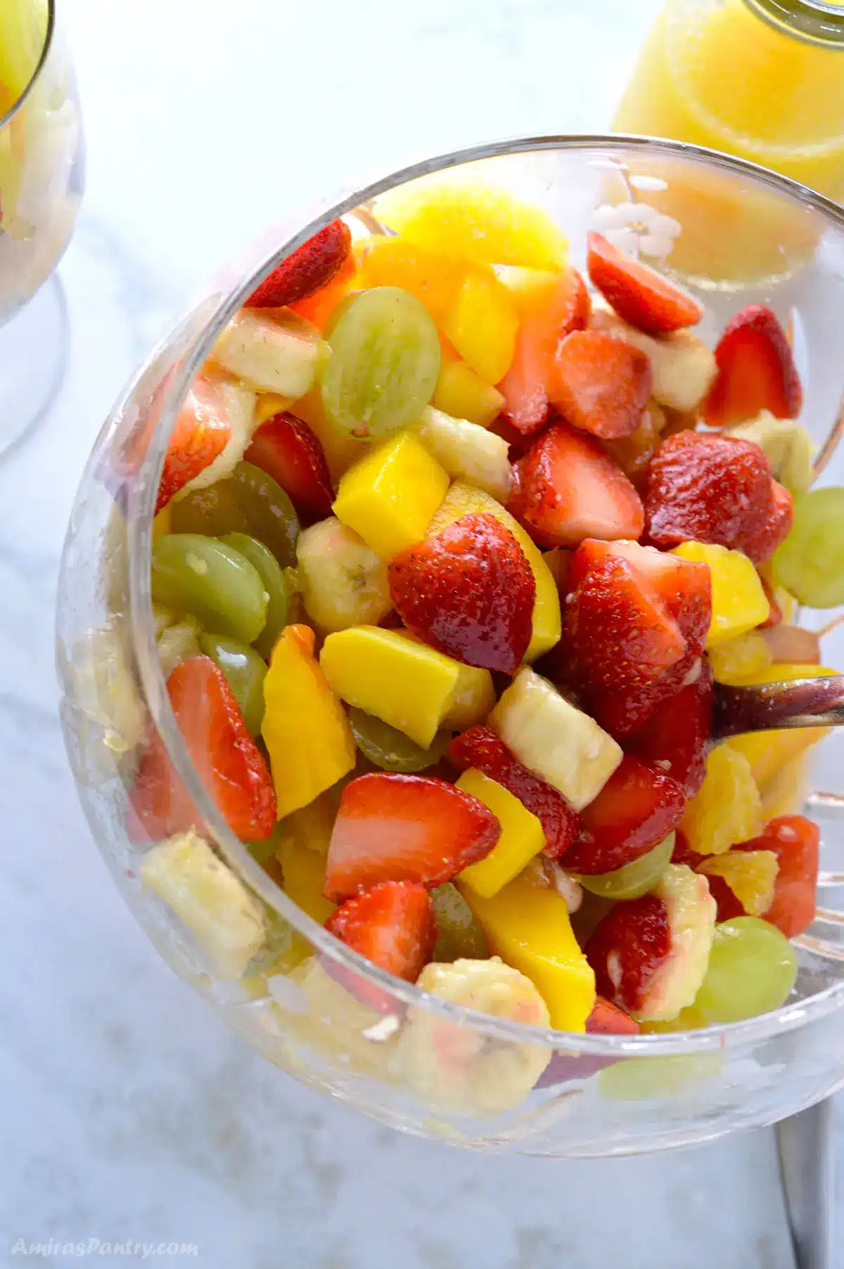 A top view of a bowl of fruit salad.