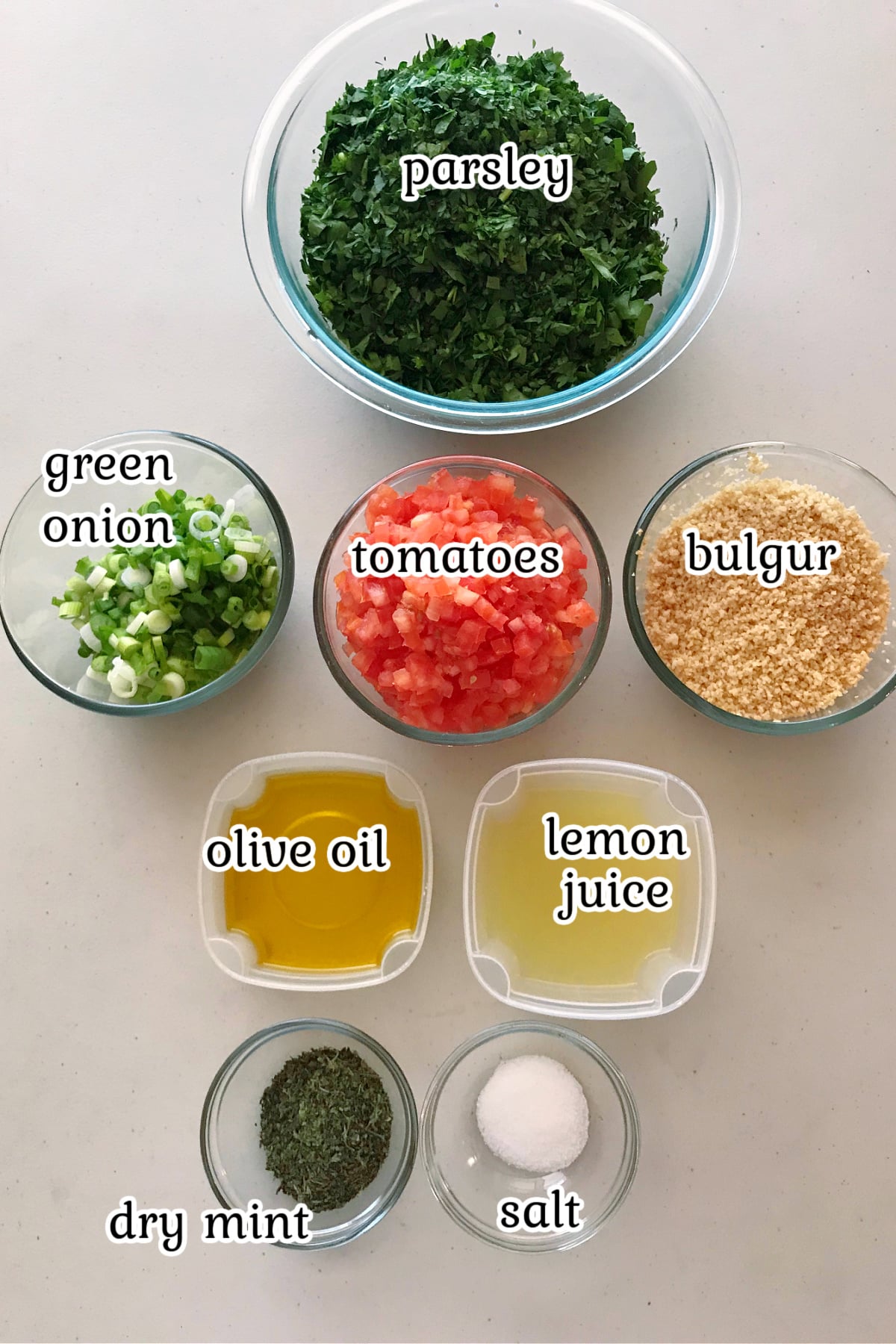 Ingredients for tabouli recipe with text overlay.