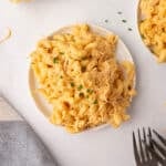 An overhead view of buffalo chicken mac and cheese garnished with parsley.