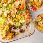 Big mac casserole with a wooden spoon.