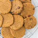 An overhead view of a pile of almond butter cookies.