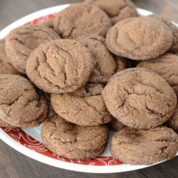 A serving plate with molasses cookies.