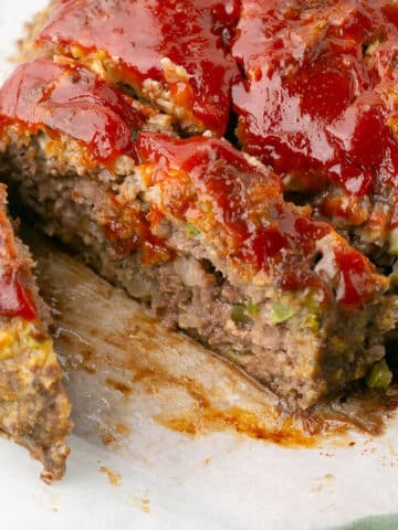A close up image of the meatloaf sliced to show texture.