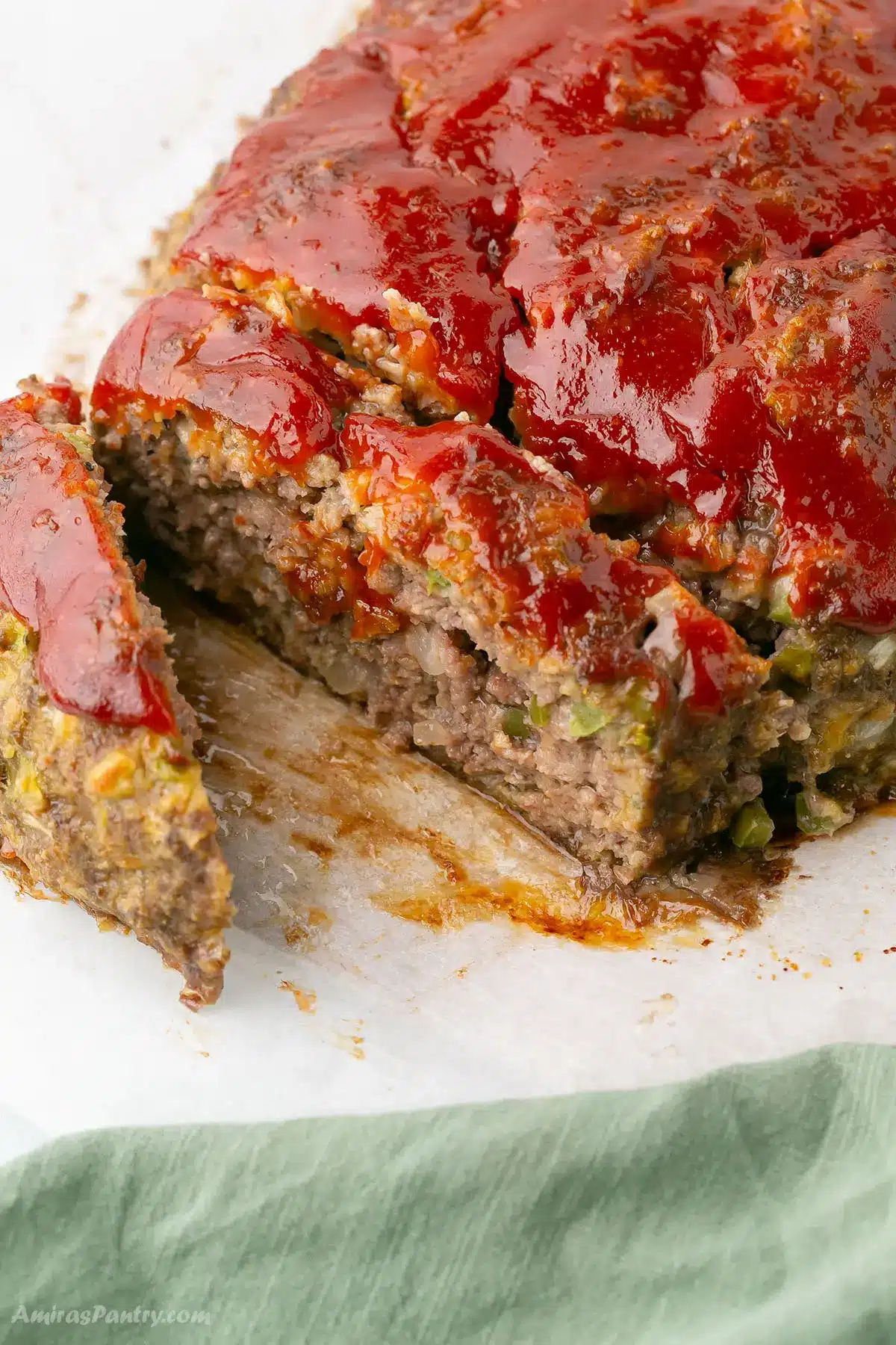 Meatloaf sliced to show texture.