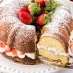 A piece of the bundt cake pulled out to be served.