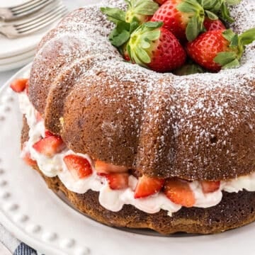Strawberry shortcake bundt cake with fresh strawberries.