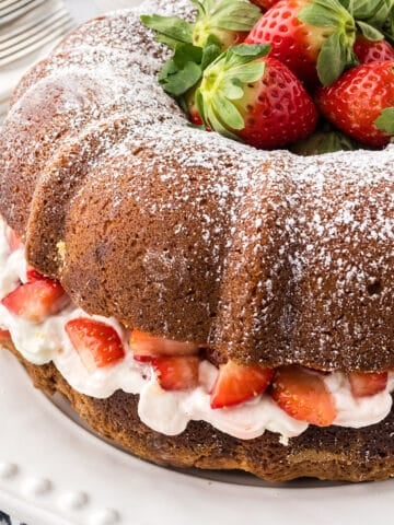 Strawberry shortcake bundt cake with fresh strawberries.
