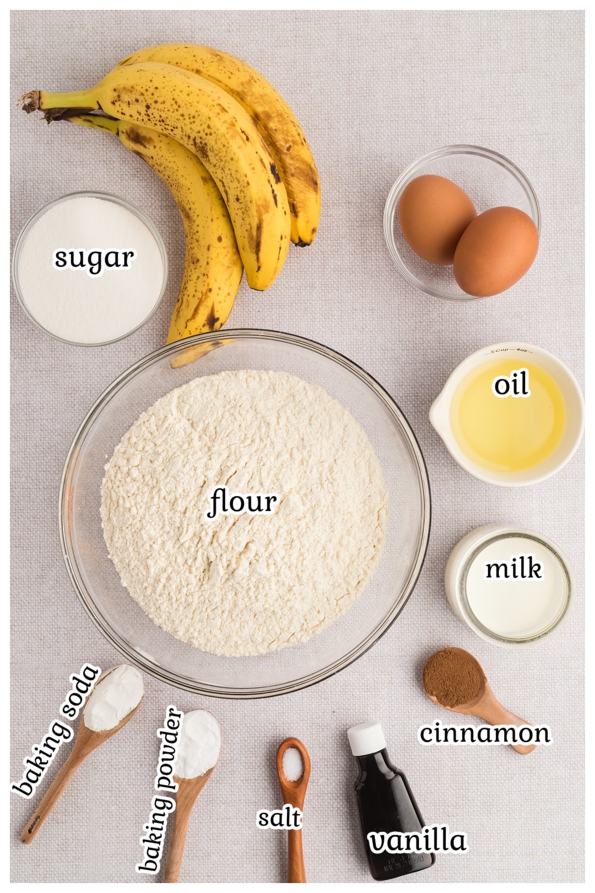 Ingredients for the banana bread on a surface.