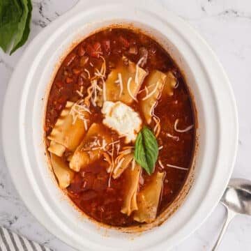 Overhead image of lasagna soup on a crockpot.