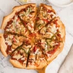 An overhead image of chicken fajita pizza.