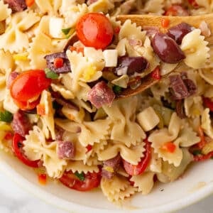 An overhead image of a bowl with pasta salad.