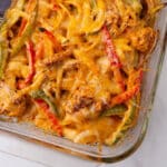 A casserole dish with chicken fajitas.