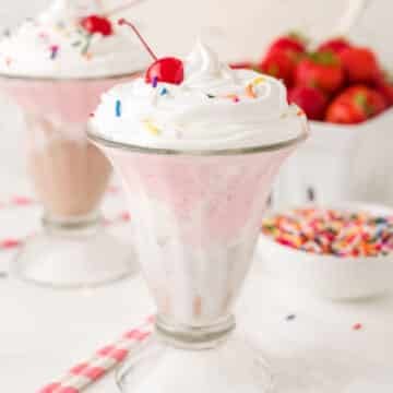 A couple of glasses with the milkshake.