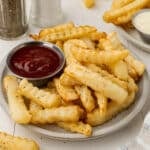French fries on a serving plate.