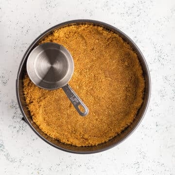 An overhead view of a graham cracker crust.