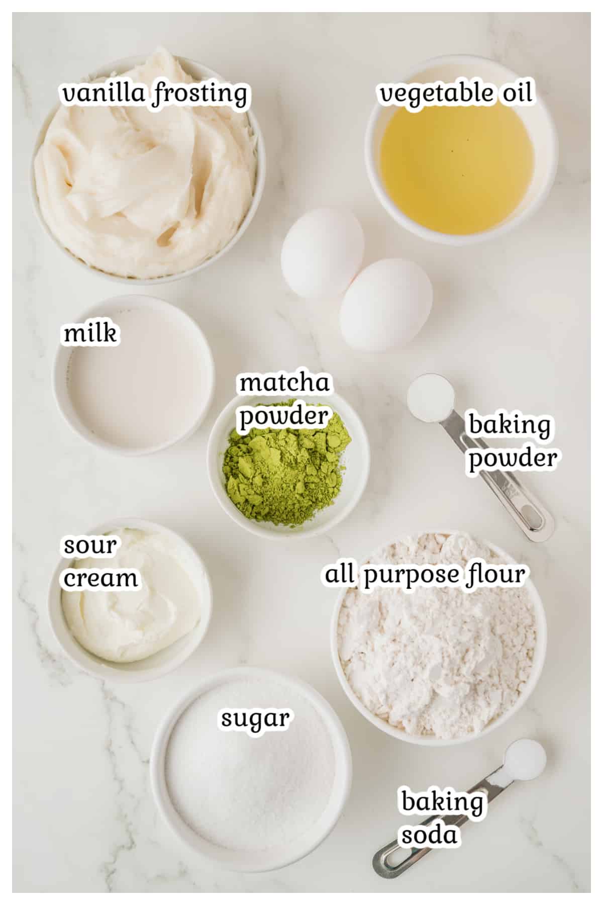 Ingredients for the matcha cupcakes on a white surface.