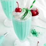 A close up image on a tall glass with shamrock shake.
