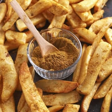 A close up look at a small bowl with fries seasoning.