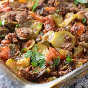 A close up image on a pyrex casserole with zucchini casserole.