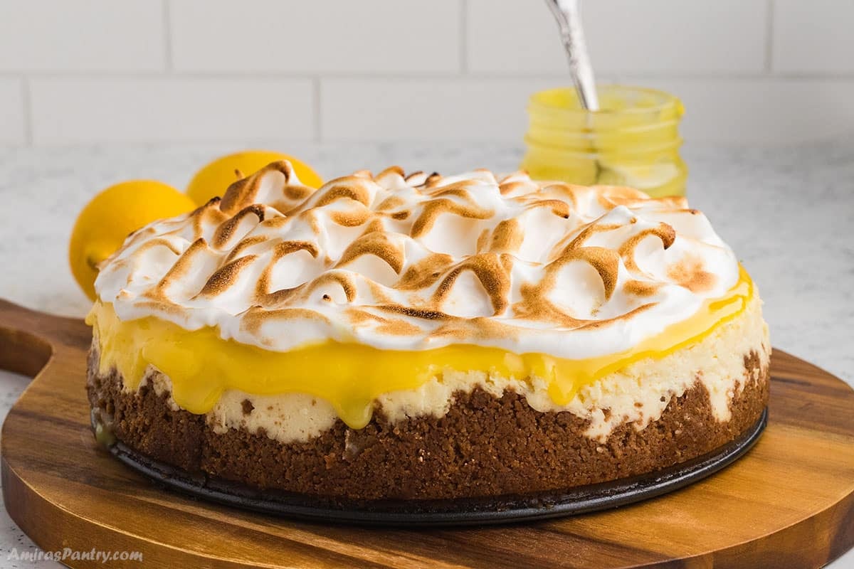 Toasted Italian meringue on a cheesecake.
