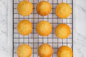 Baked cupcakes on a cooling rack.
