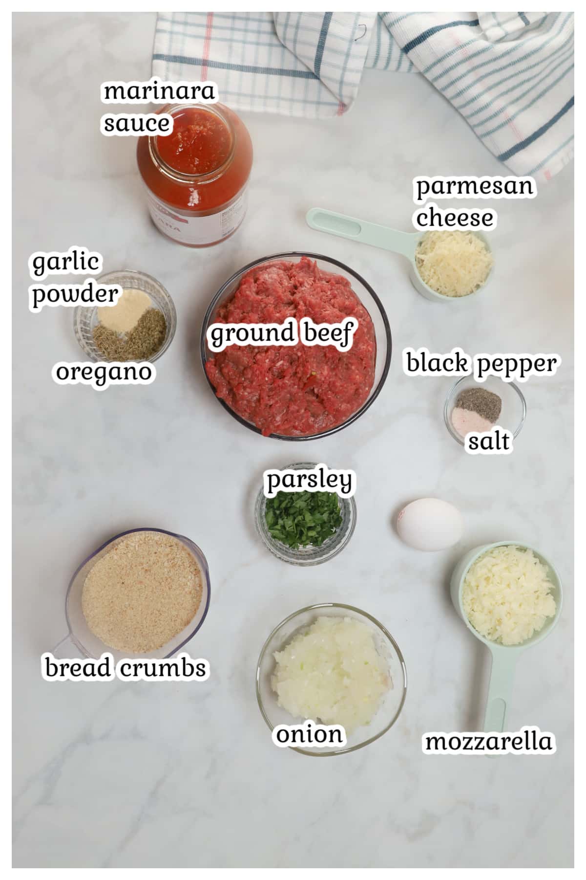 Meatballs ingredients on a countertop.