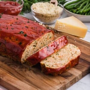 Chicken meatloaf on a wooden board.