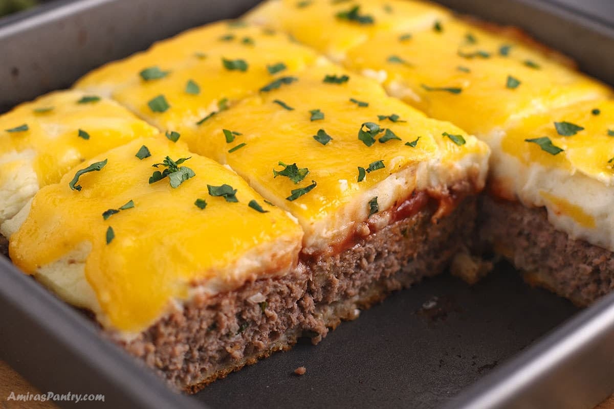 An image of meatloaf casserole cut to show texture.