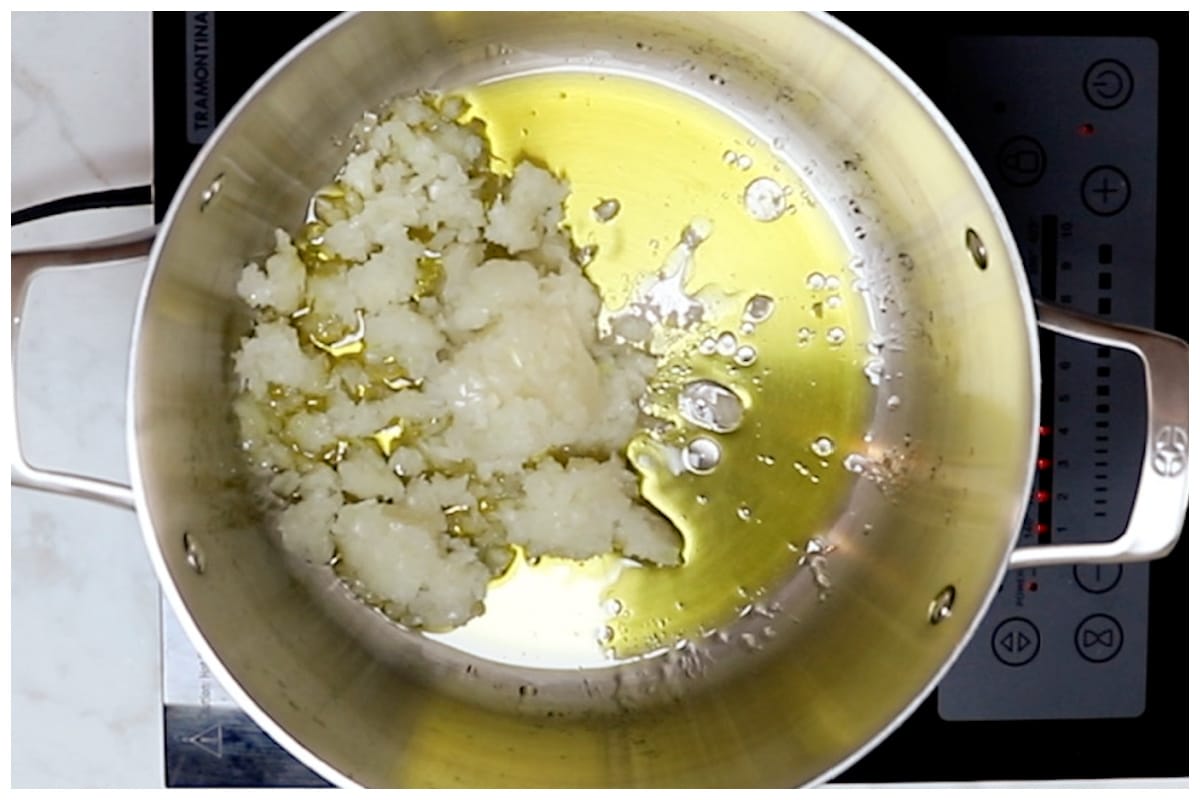 Saute onion in a large pot.