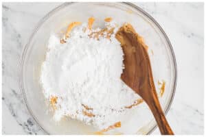 Powdered sugar in a bowl with peanut butter.