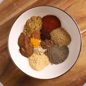 An overhead image of a bowl with homemade shawarma seasoning.
