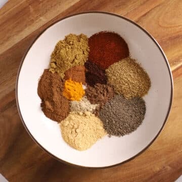 An overhead image of a bowl with homemade shawarma seasoning.