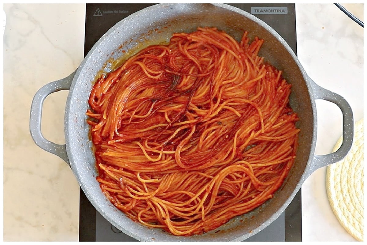 Scorched spaghetti in a pan.