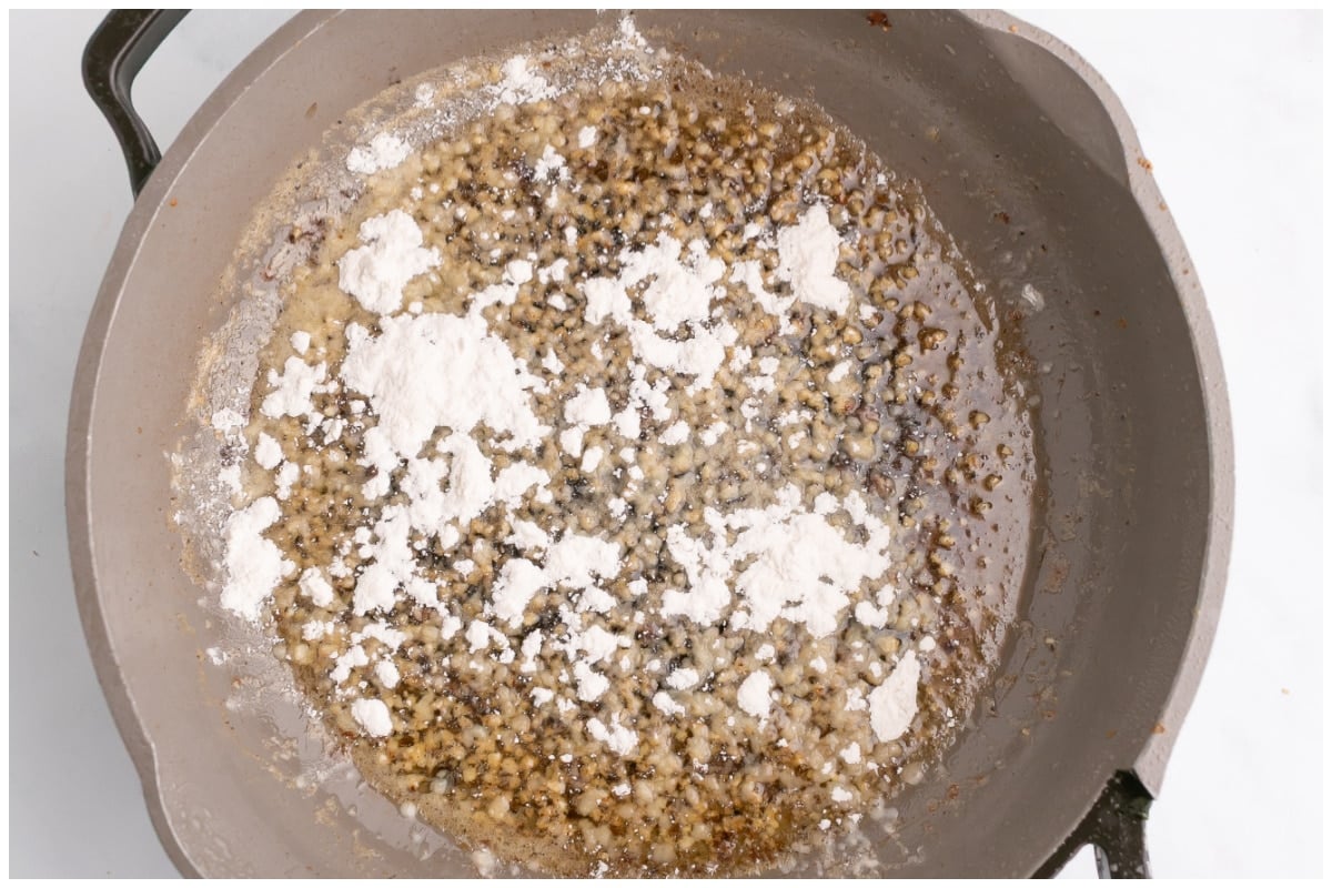 Flour sprinkled over garlic butter.