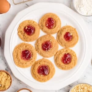 Peanut butter cookies on a white plate.